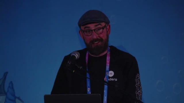 Speaker on stage at ETHDenver 2024